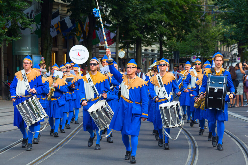 Zurich city orchestra traditional costumes Swiss National Day parade Switzerland
